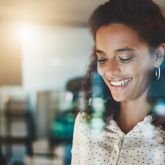 A woman is analyzing data at work.