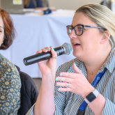 Image of two women in a leadership training program.