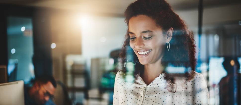 A woman is analyzing data at work.