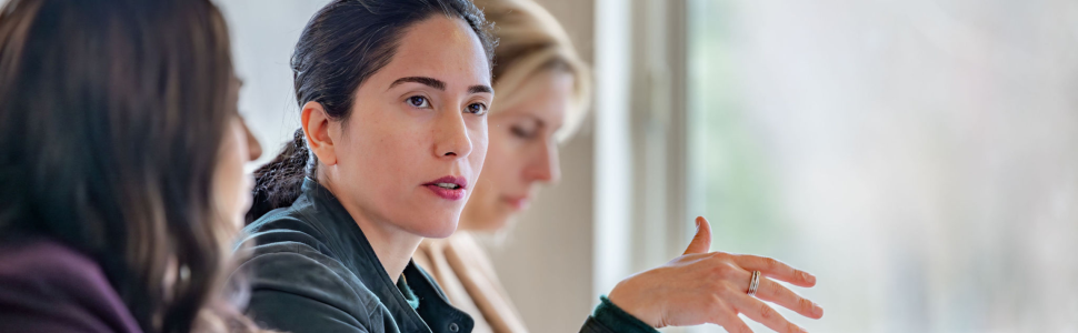 Woman talking during an executive leadership development program.